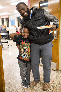 Dad visiting daughter at school.