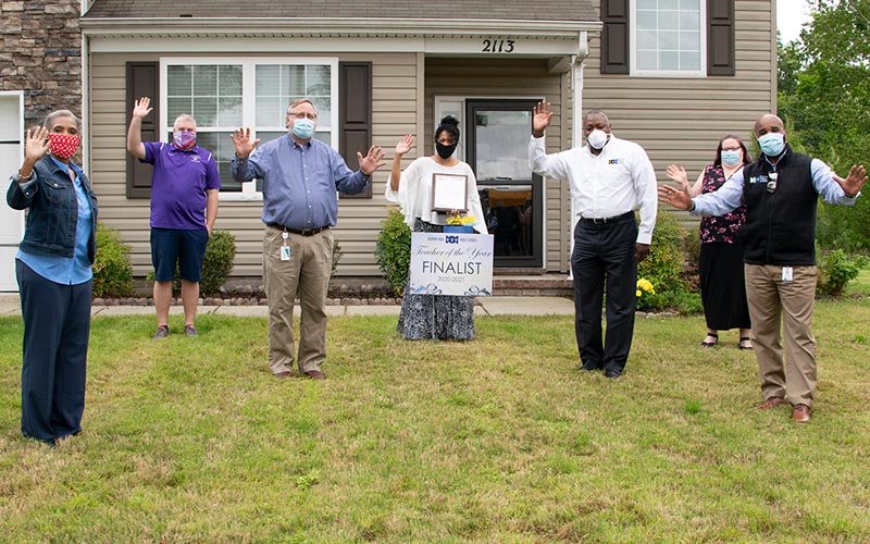 Dr. Dionne Ellis celebrates with the Prize Patrol.